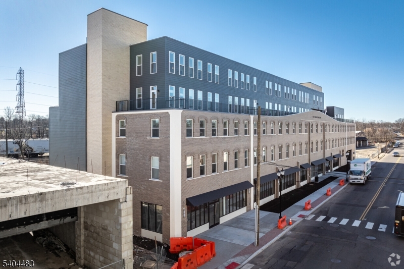 18 West Main Street, Unit 412 Bound Brook, NJ 08805 - Photo 15 of 27 a large building with a street