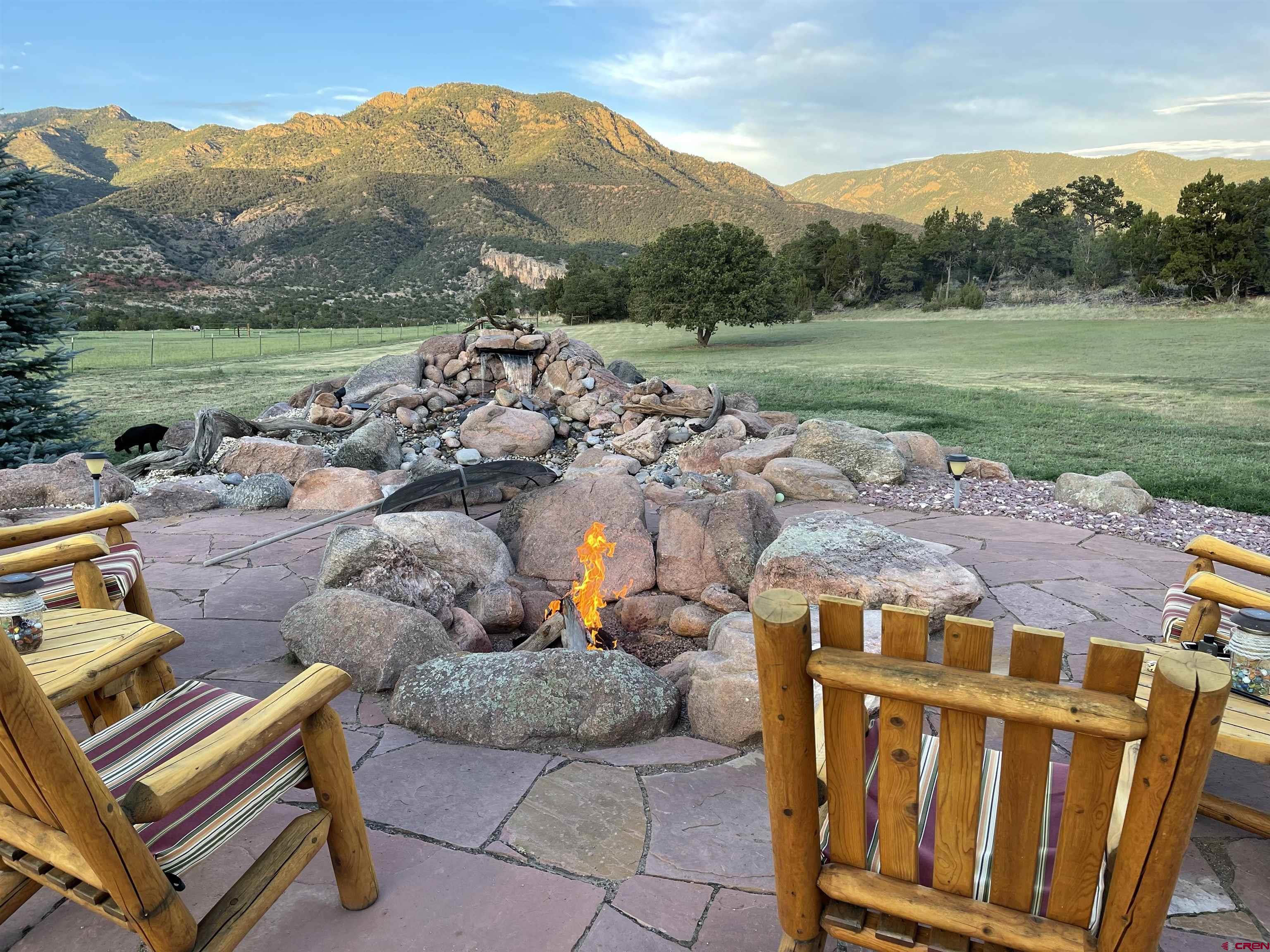 a view of a backyard with golf course