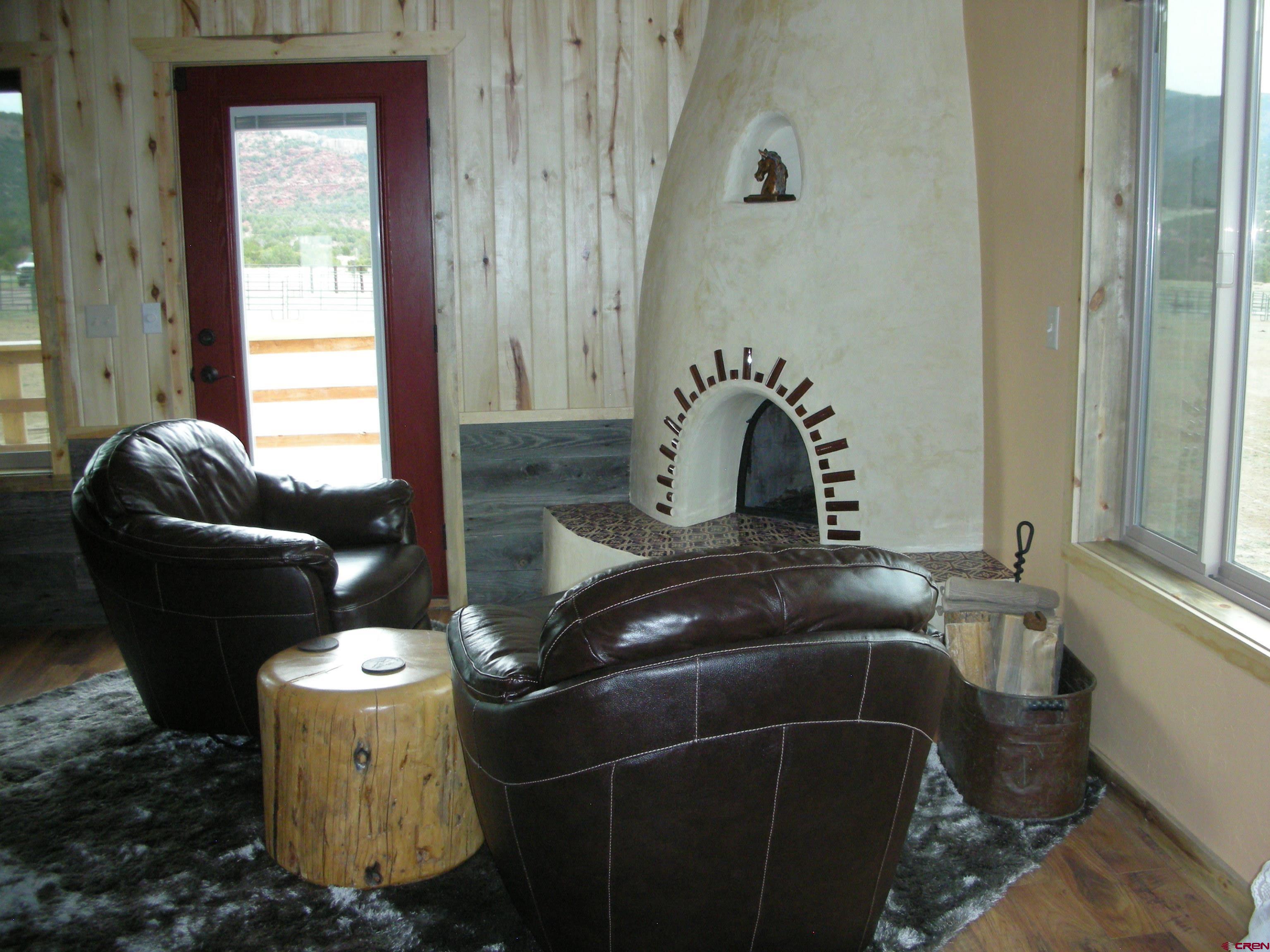 521 Dilley Ranch Road Canon City, CO 81212 - Photo 12 of 20 a bathroom with a toilet sink and mirror