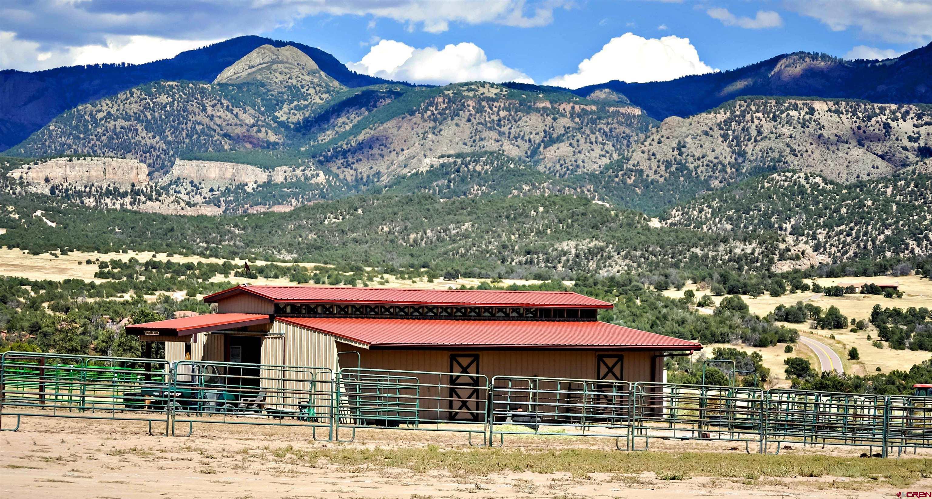 521 Dilley Ranch Road Canon City, CO 81212 - Photo 5 of 20 a front view of a house with garden