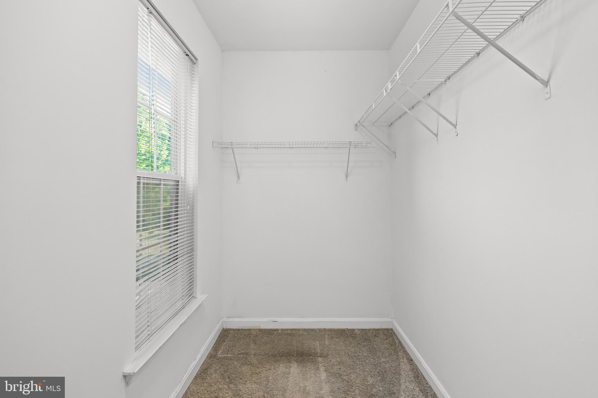 151 Wildflower Place Delran, NJ 08075 - Photo 22 of 29 a view of small space with racks on the wall