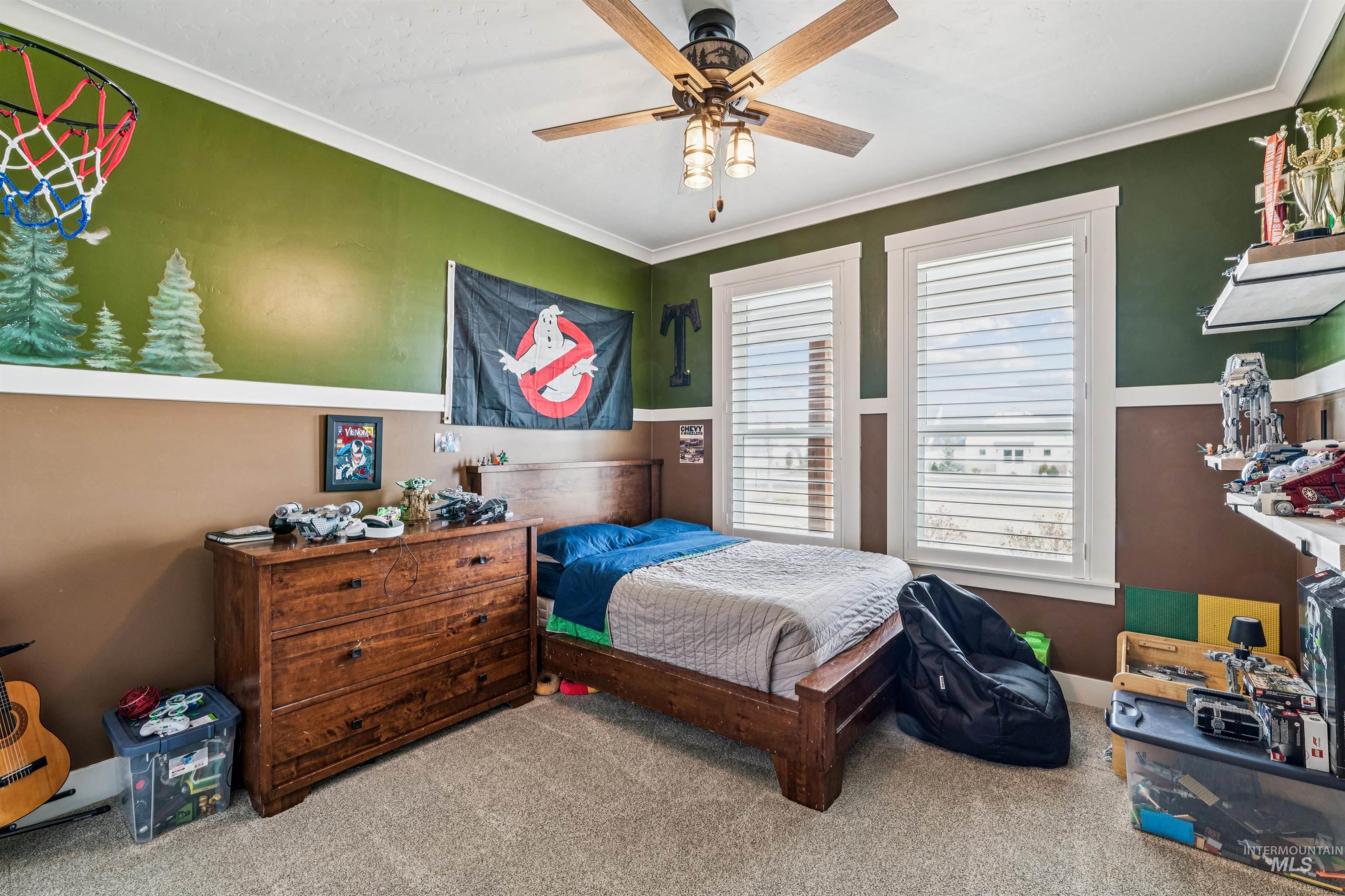 547 Bass Run Lane Marsing, ID 83639 - Photo 22 of 49 Carpeted bedroom featuring a ceiling fan and crown molding