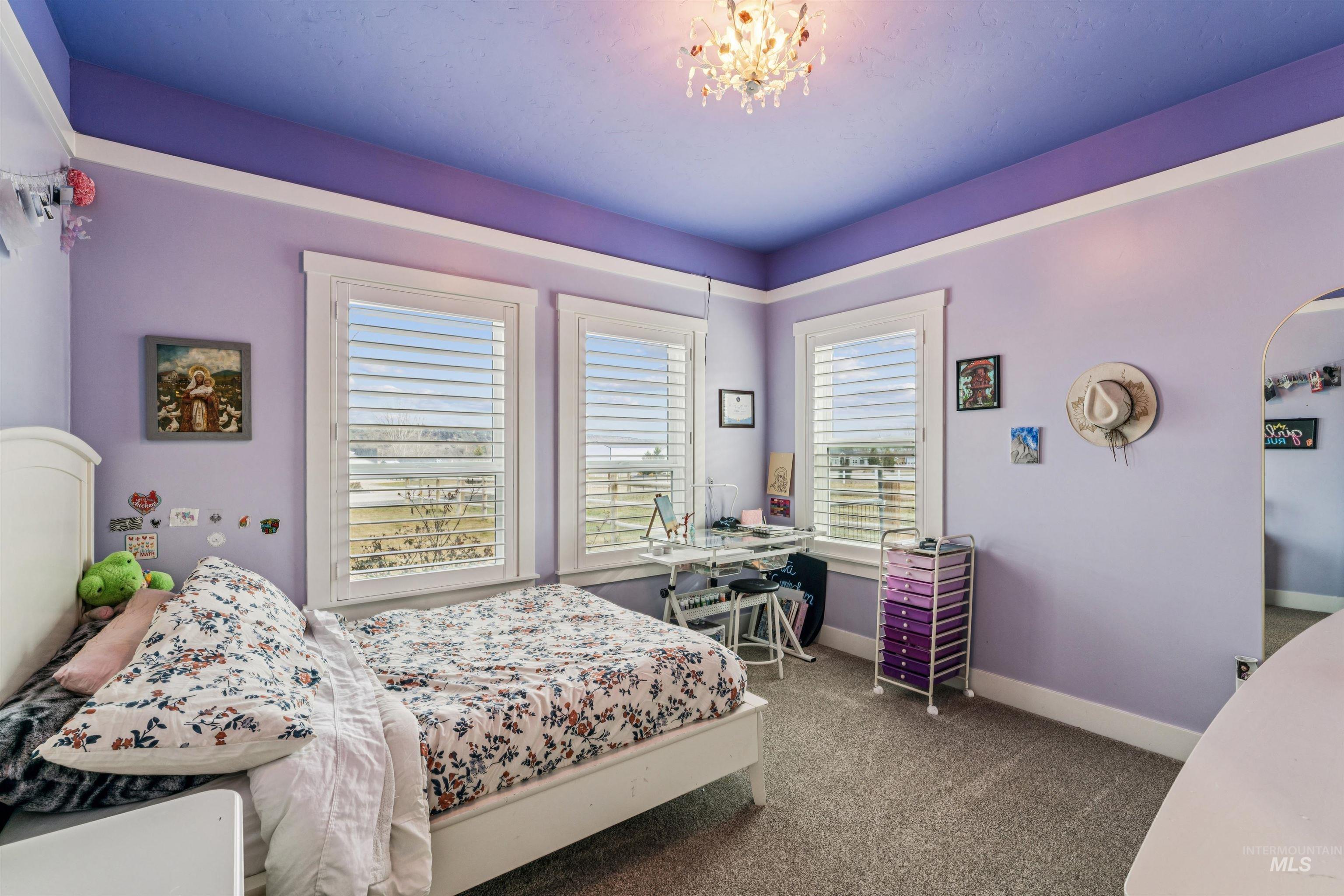 547 Bass Run Lane Marsing, ID 83639 - Photo 24 of 49 Bedroom featuring carpet, a chandelier, and an office area