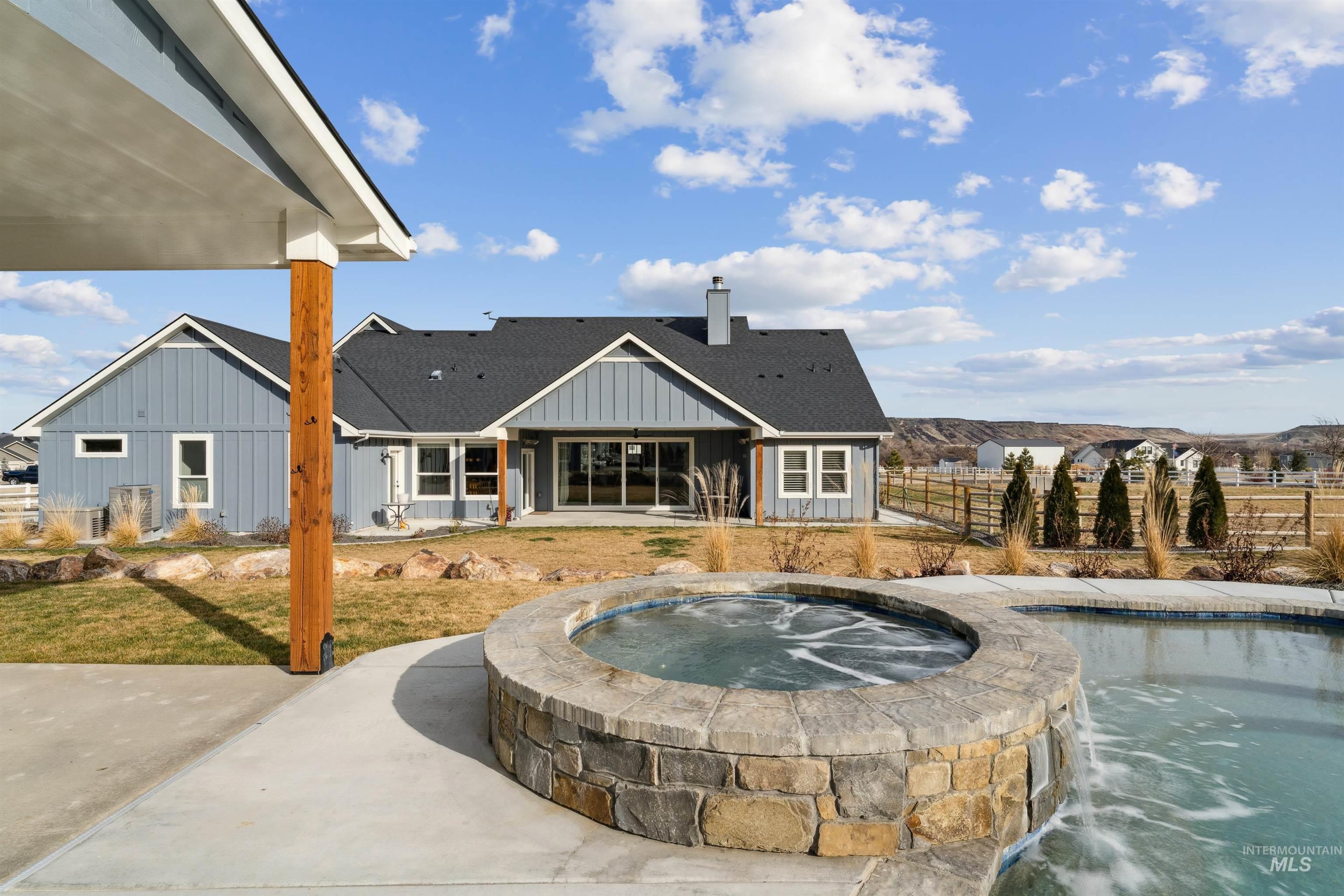 547 Bass Run Lane Marsing, ID 83639 - Photo 30 of 49 Relaxing pool / spa with a patio and a fenced backyard