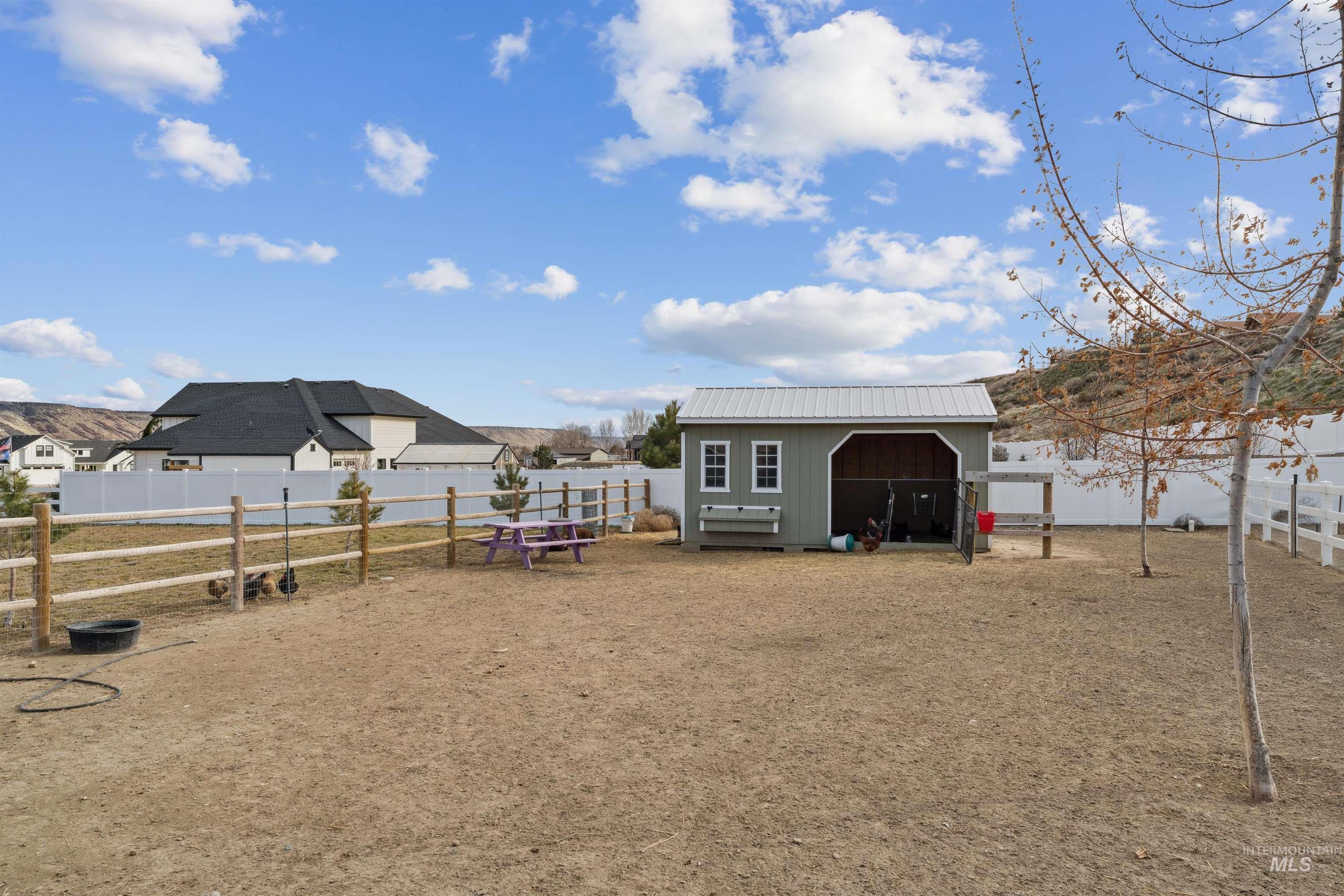 547 Bass Run Lane Marsing, ID 83639 - Photo 40 of 49 View of outbuilding with a fenced backyard