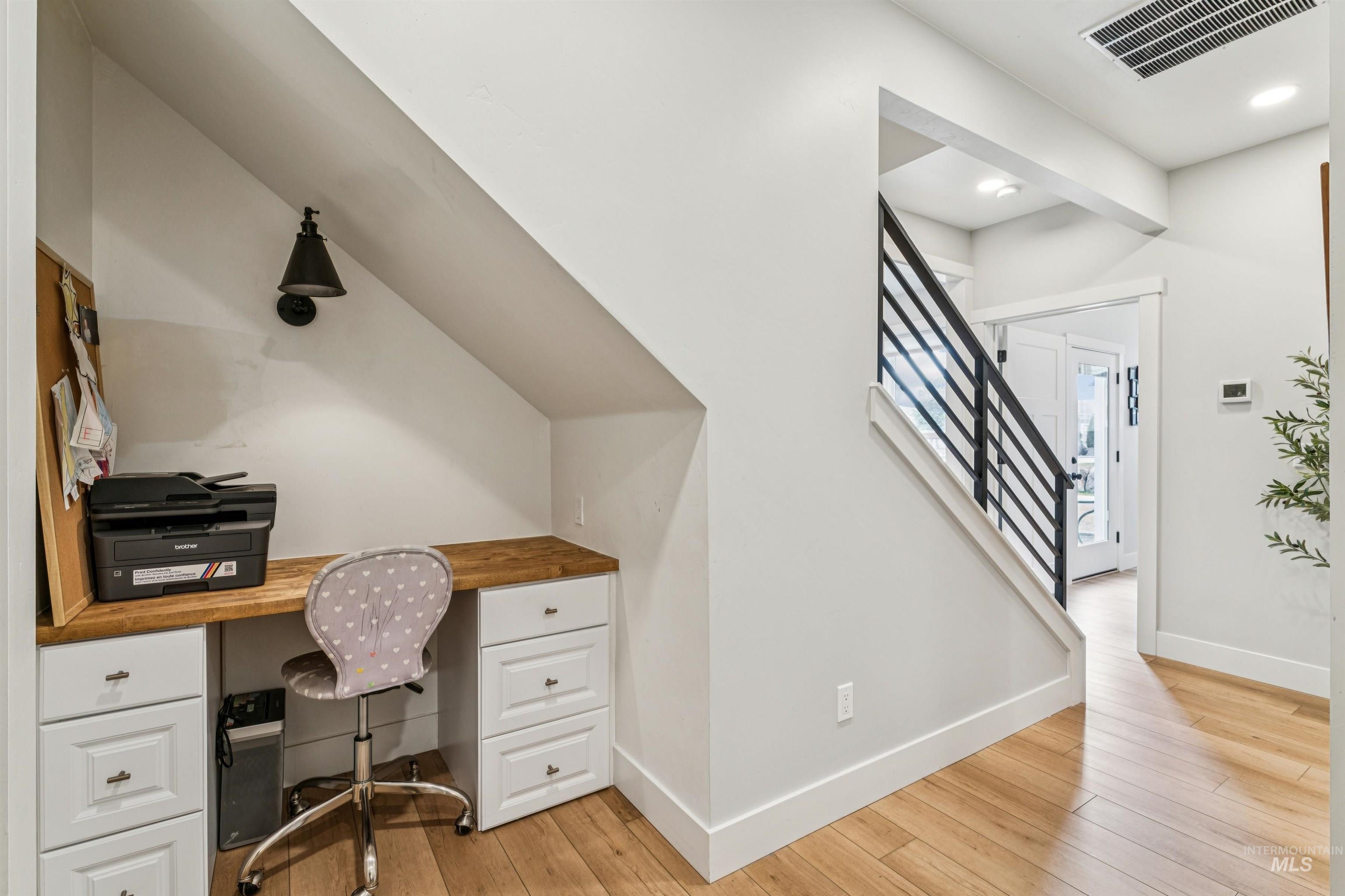 547 Bass Run Lane Marsing, ID 83639 - Photo 49 of 49 Office area with light wood-style floors and baseboards