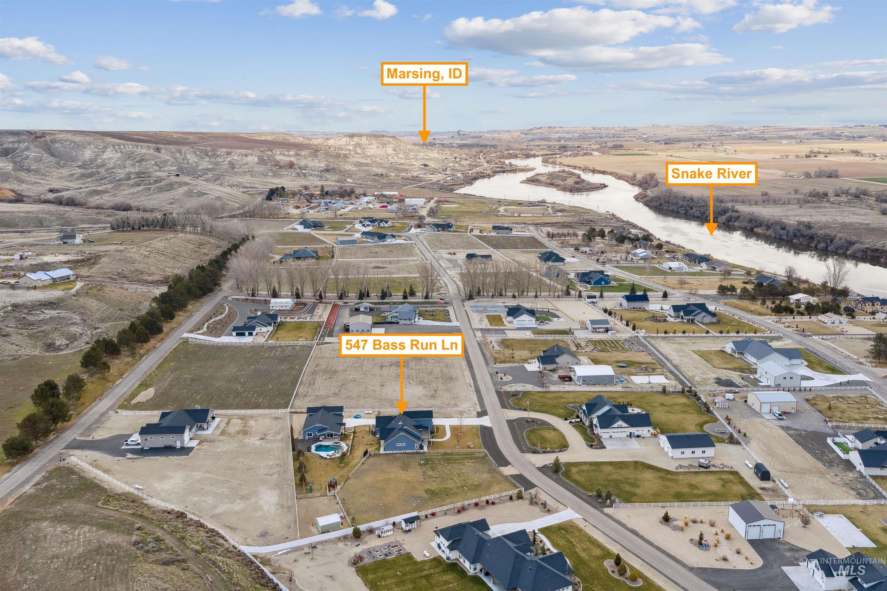 547 Bass Run Lane Marsing, ID 83639 - Photo 7 of 49 View of property location featuring a large body of water and nearby suburban area