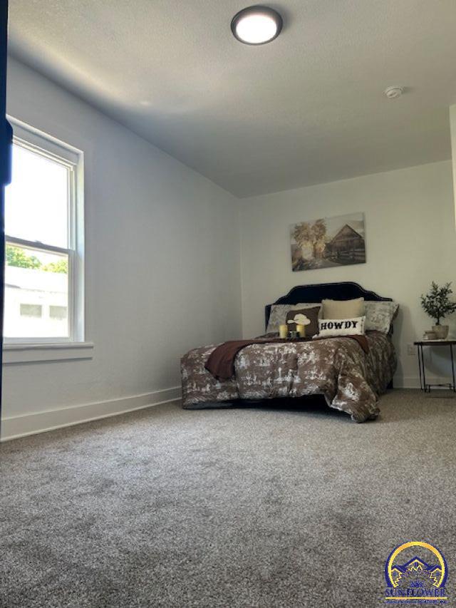 1024 Southwest Clay Street Topeka, KS 66604 - Photo 14 of 27 Upper Level Bedroom with Huge Walk in Closet
