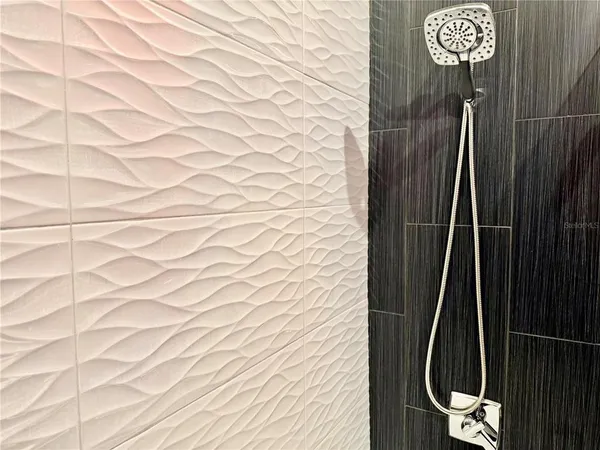 a close view of shower tap