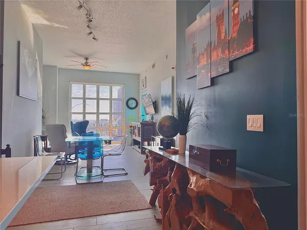 a living room with furniture and a window