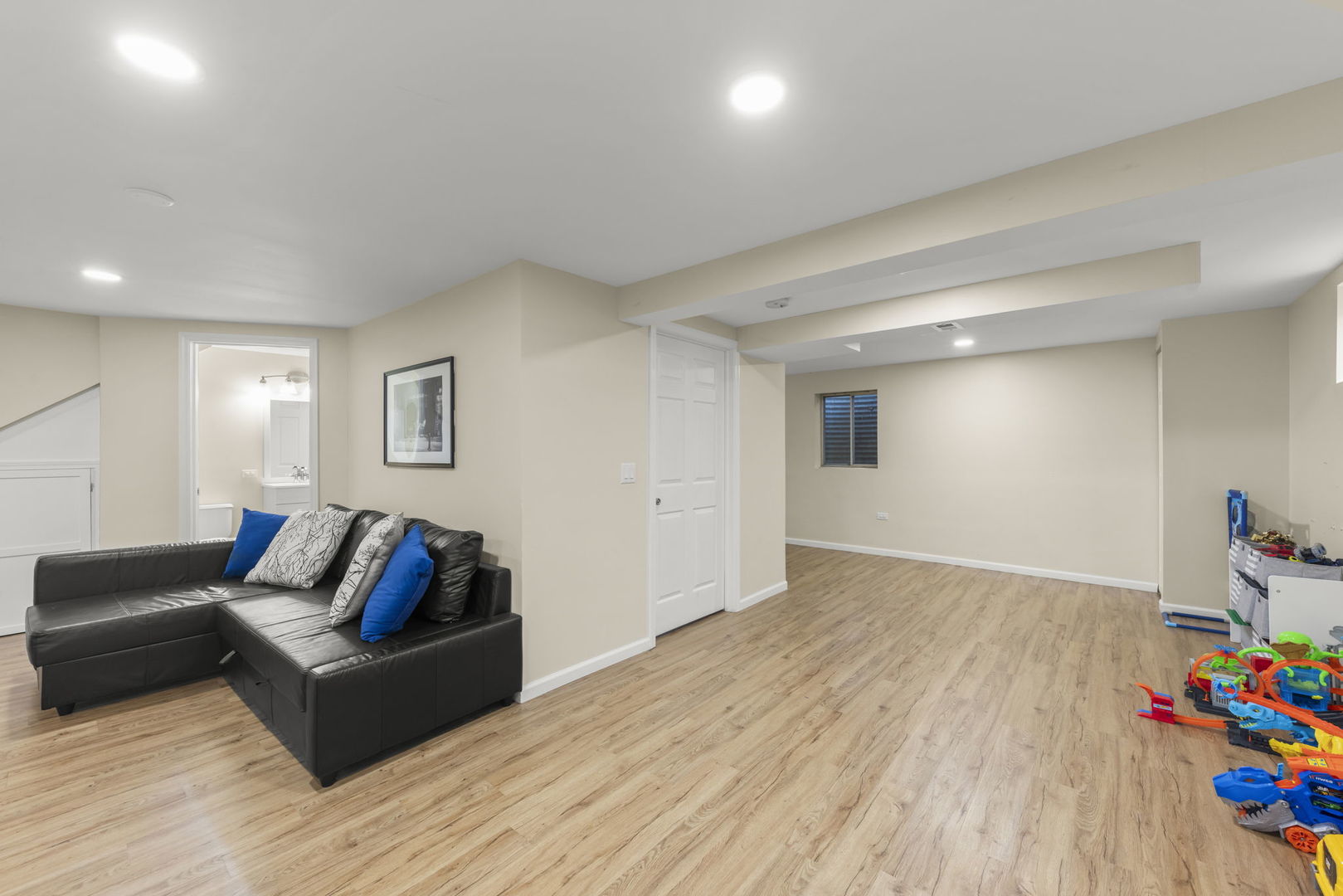 1301 Peshtigo Avenue Naperville, IL 60564 - Photo 21 of 30 a living room with furniture and a wooden floor