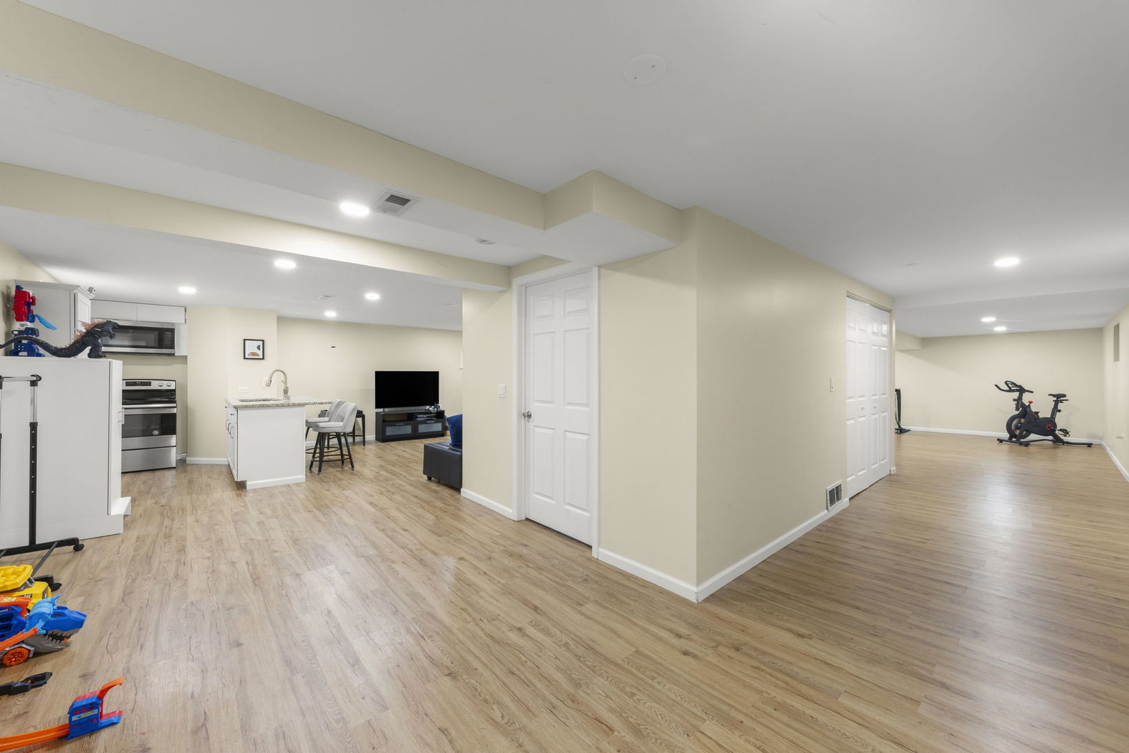 1301 Peshtigo Avenue Naperville, IL 60564 - Photo 22 of 30 a view of a living room kitchen and a wooden floor