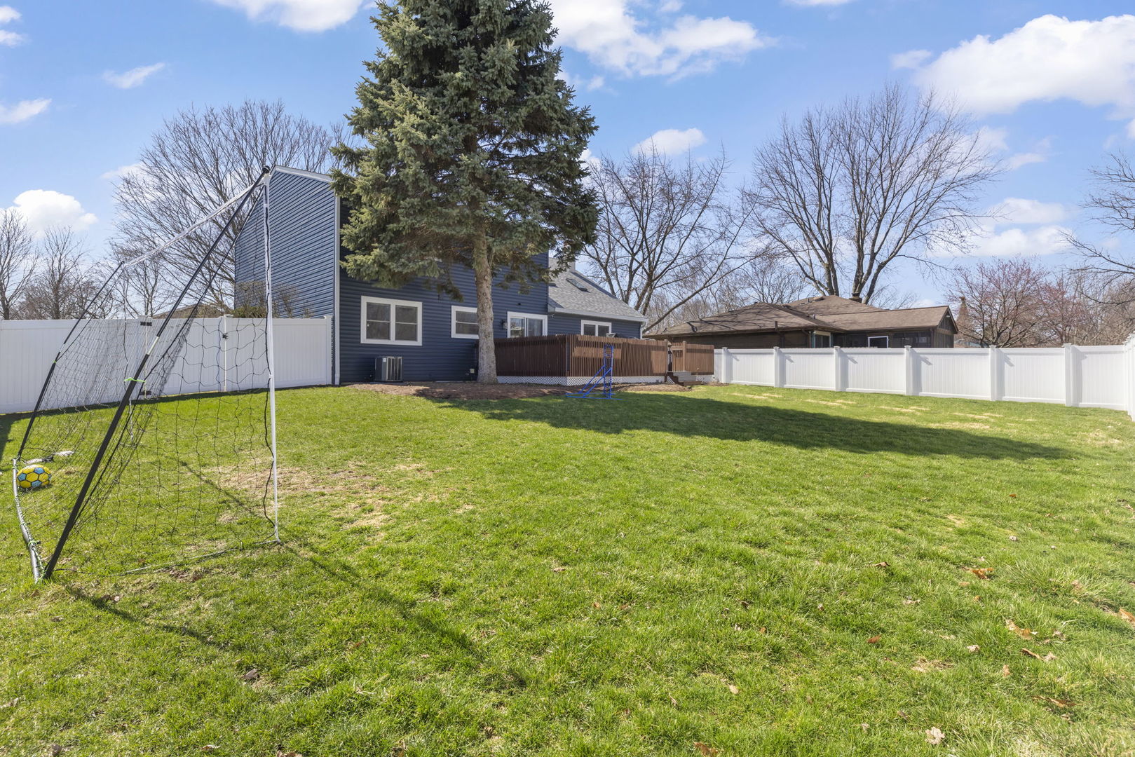 1301 Peshtigo Avenue Naperville, IL 60564 - Photo 25 of 30 a house view with a sitting space and garden