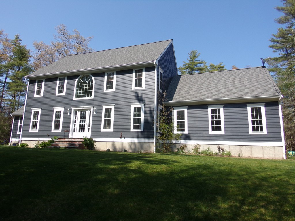 224 Perry Hill Road Acushnet, MA 02743 - Photo 3 of 30 a front view of a house with a yard