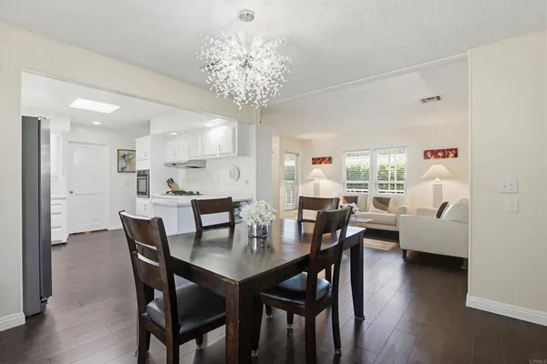 a bedroom with a bed and a table in it