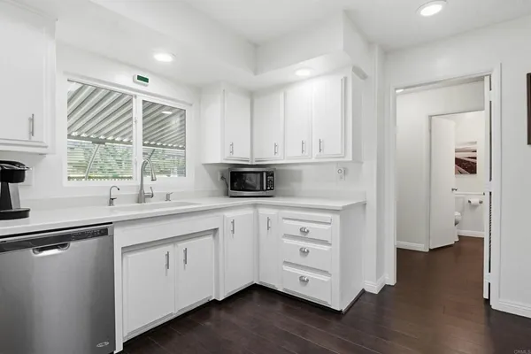 a dining room with furniture window and outside view