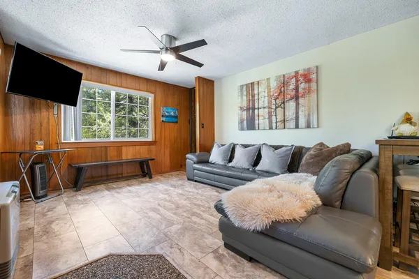 a view of a dining room with furniture window and outside view