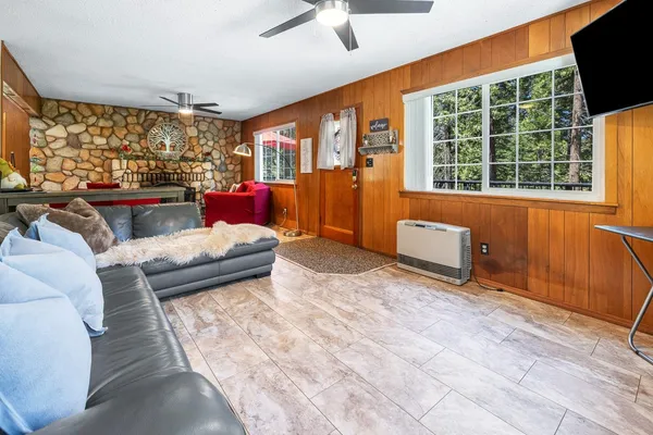 a kitchen with stainless steel appliances granite countertop a sink and a cabinets
