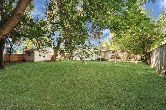 a view of a house with a big yard