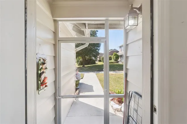 a kitchen with a sink stove and refrigerator