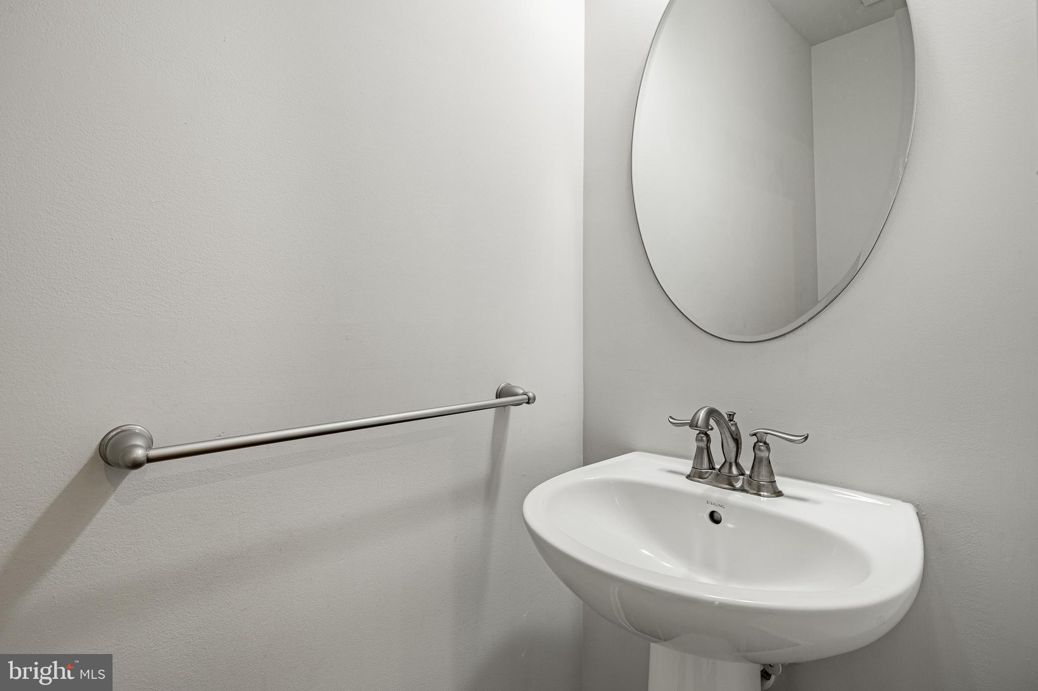 300 Blue Welsh Street Malvern, PA 19355 - Photo 13 of 37 a bathroom with a sink and a mirror