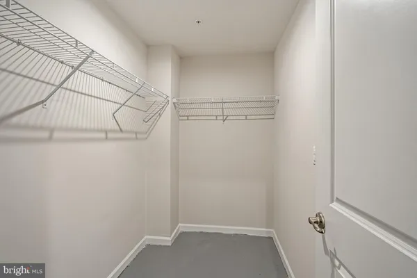 a view of a room with racks on the wall