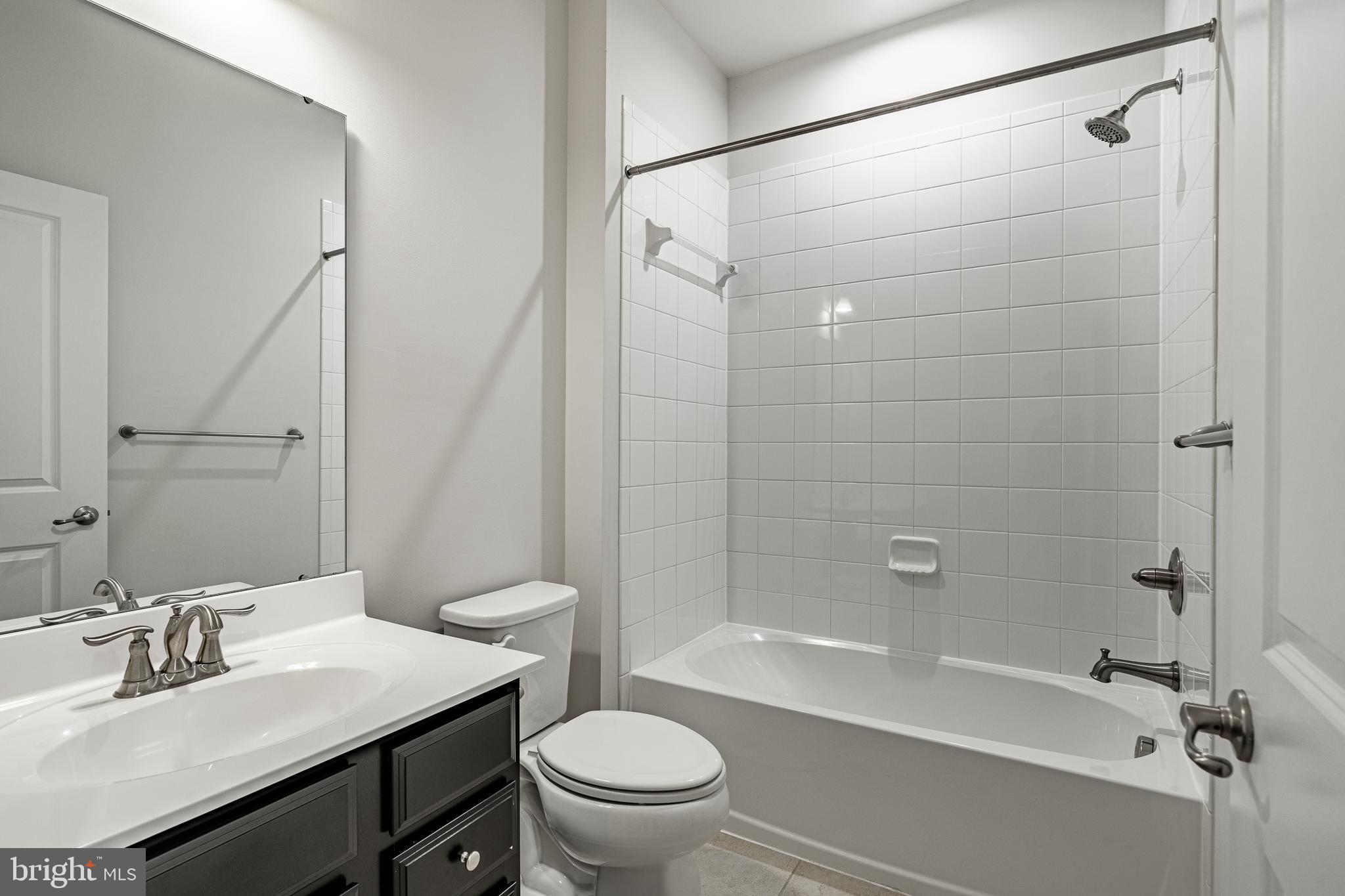 300 Blue Welsh Street Malvern, PA 19355 - Photo 21 of 37 a bathroom with a sink a toilet and shower