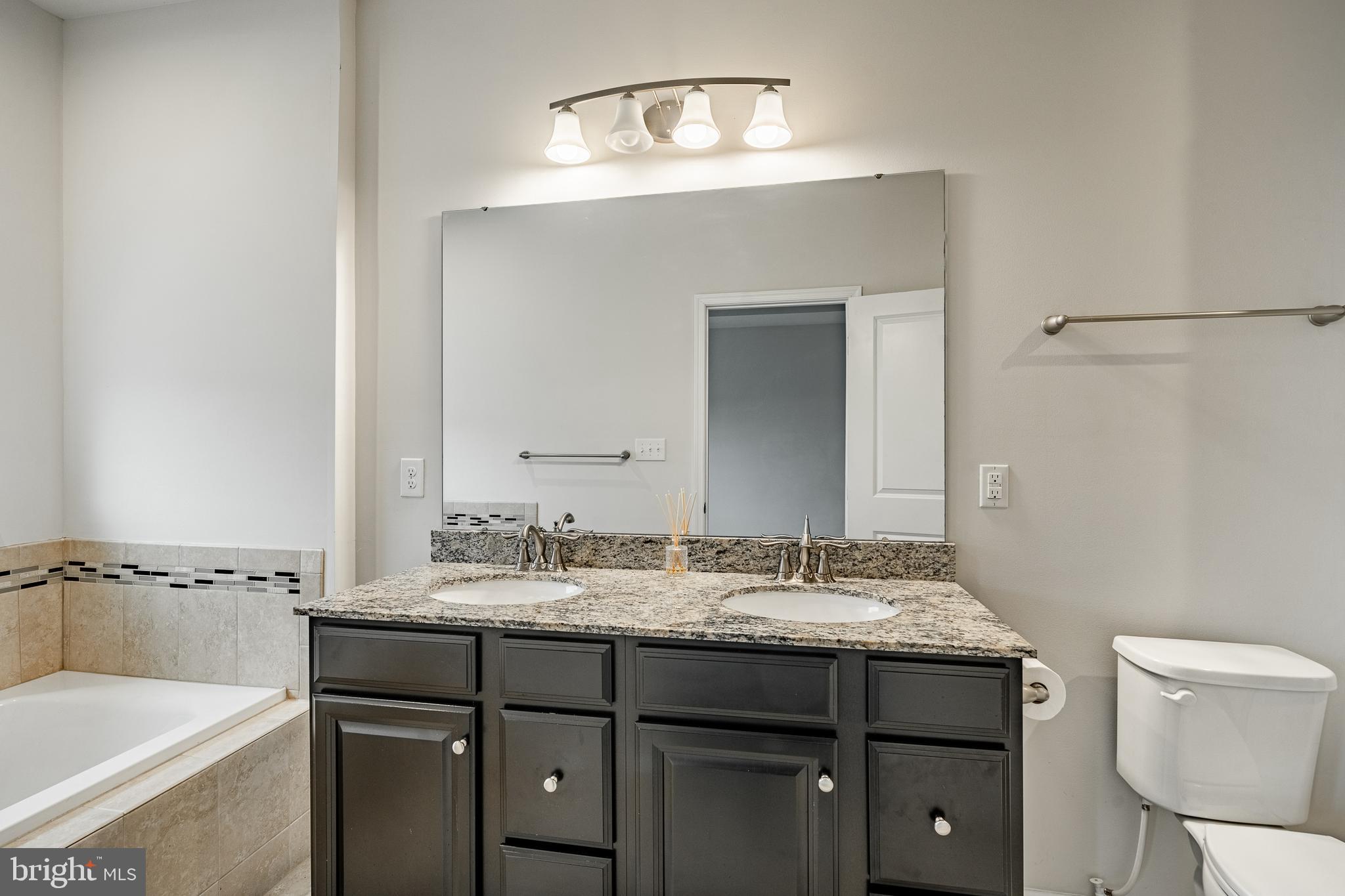 300 Blue Welsh Street Malvern, PA 19355 - Photo 25 of 37 a bathroom with a sink and a mirror