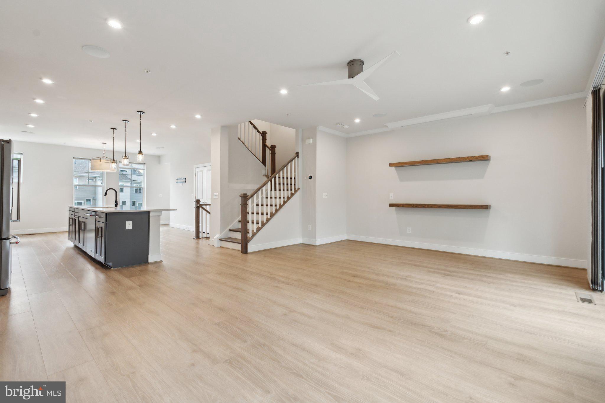3034 Declan Way Falls Church, VA 22044 - Photo 16 of 41 a view of an empty room with wooden floor