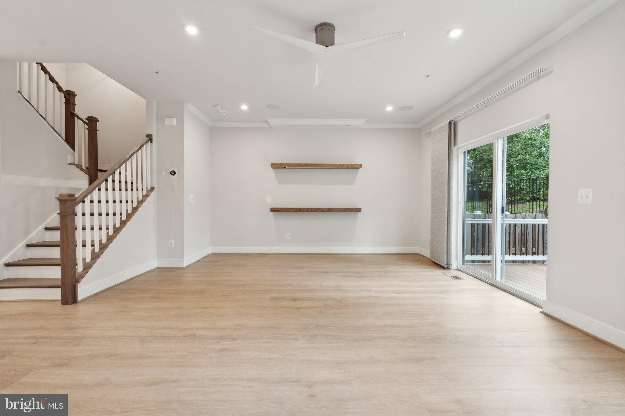 3034 Declan Way Falls Church, VA 22044 - Photo 17 of 41 a view of an empty room with wooden floor and a window