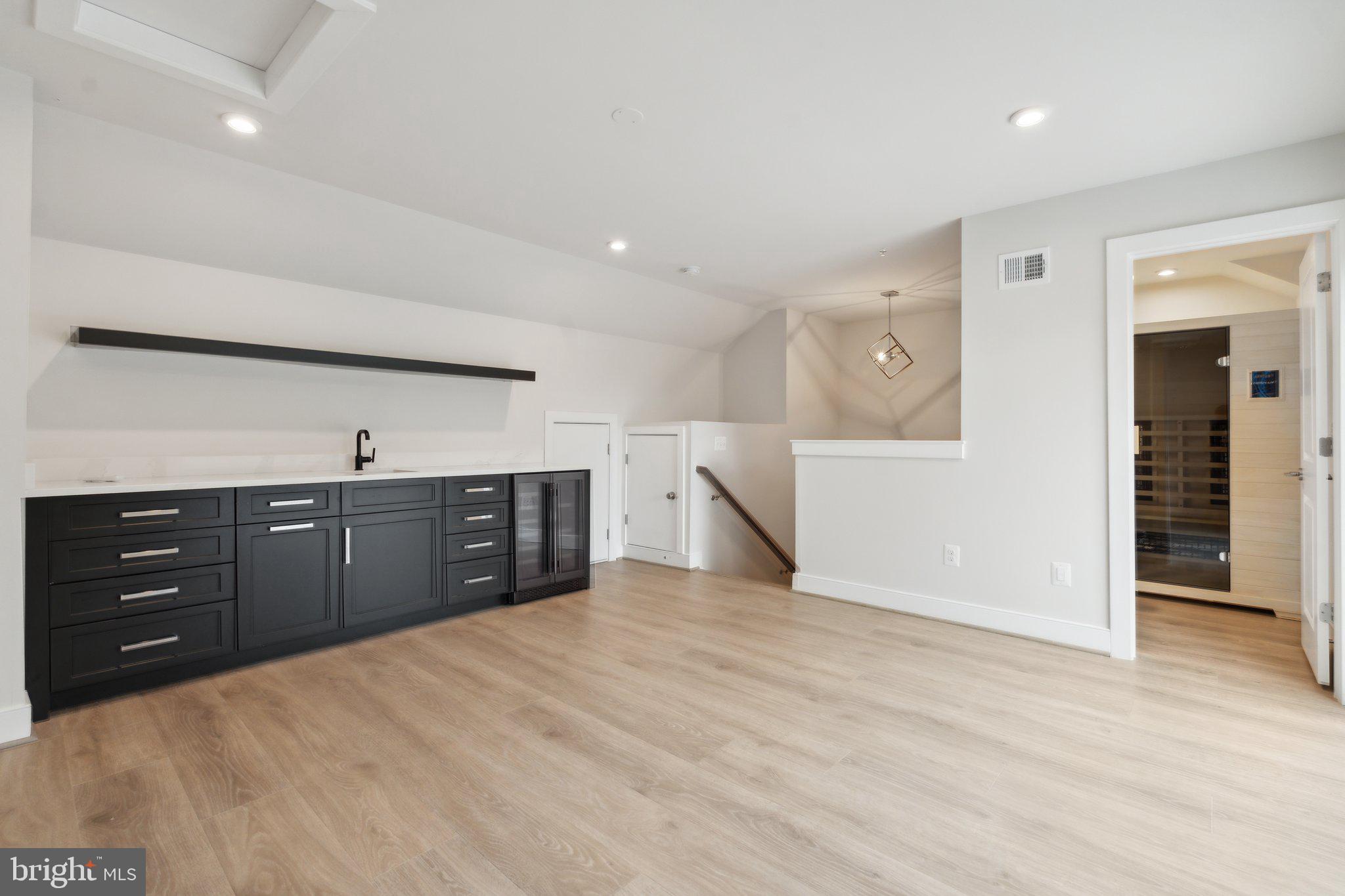 3034 Declan Way Falls Church, VA 22044 - Photo 34 of 41 an empty room with closet and cabinet