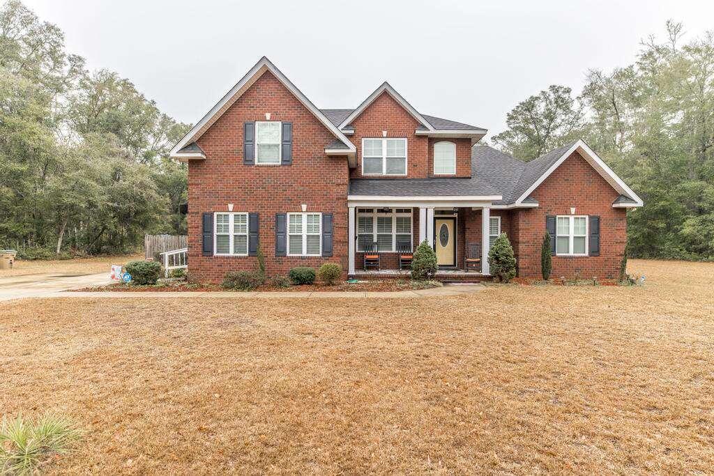 728 Martin Road Midway, GA 31320 - Photo 1 of 1 front view of a house with a yard