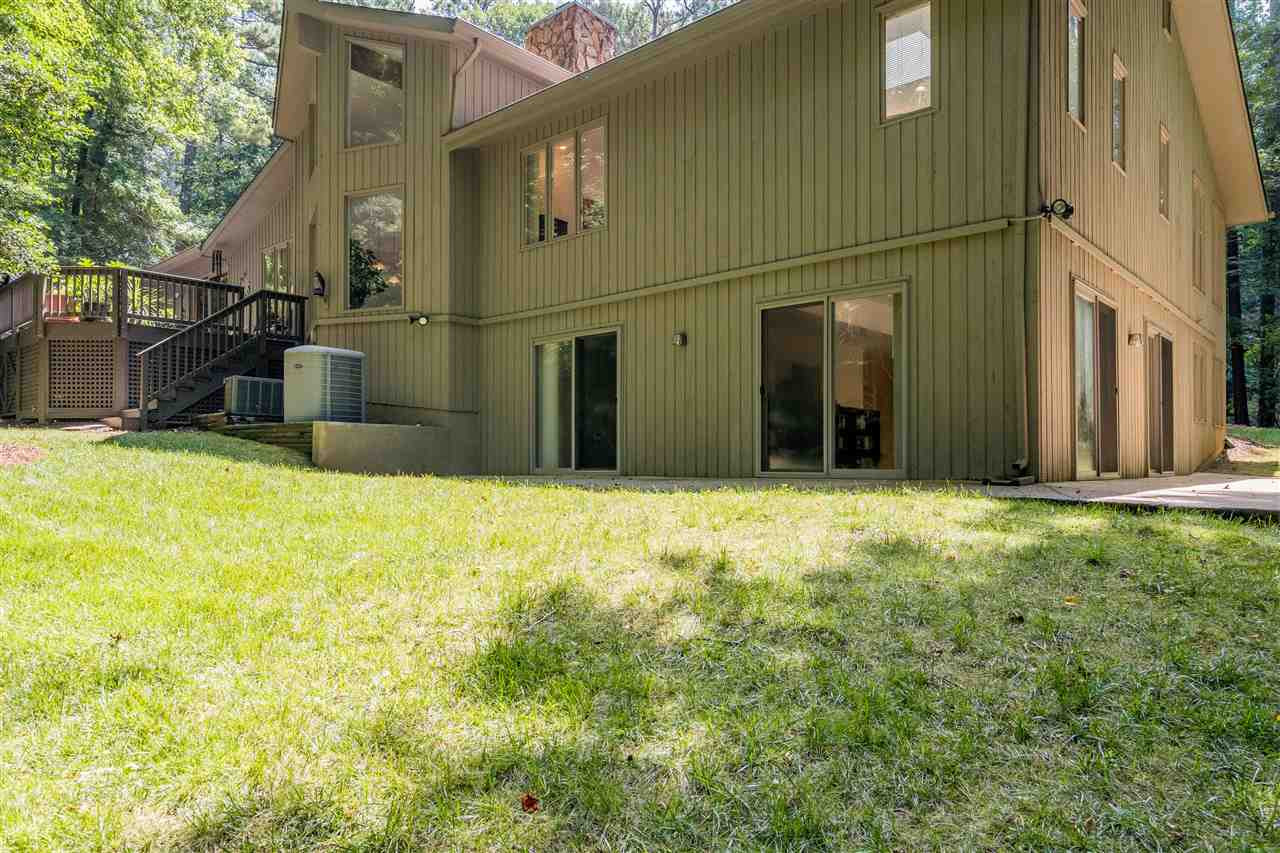 2108 Countrywood Road North Raleigh, NC 27615 - Photo 27 of 30 So many exits to the rear of the property. Such a beautiful setting. Rear of Home