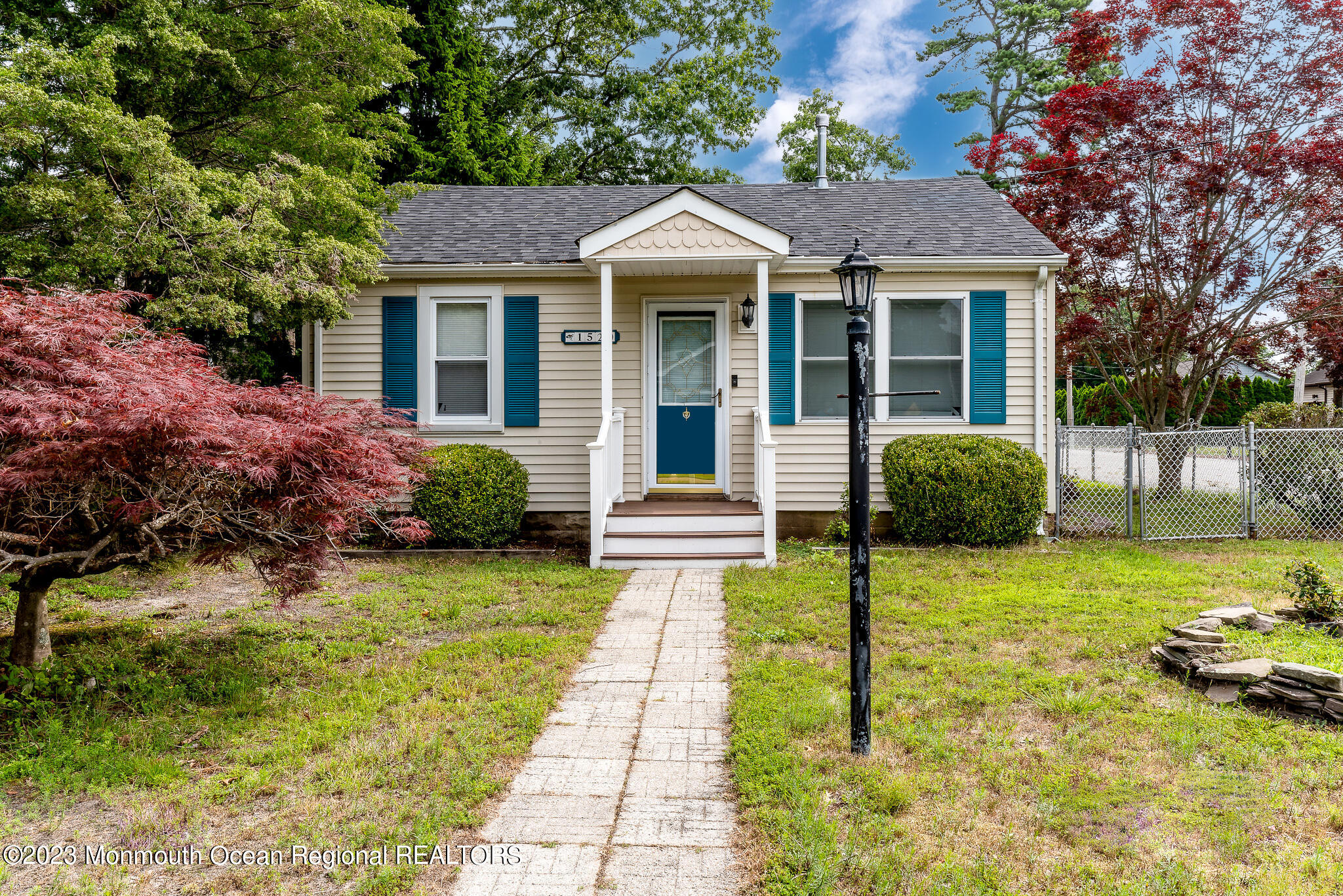 1520 Whitcomb Road Forked River, NJ 08731 - Photo 2 of 31 a front view of a house with garden