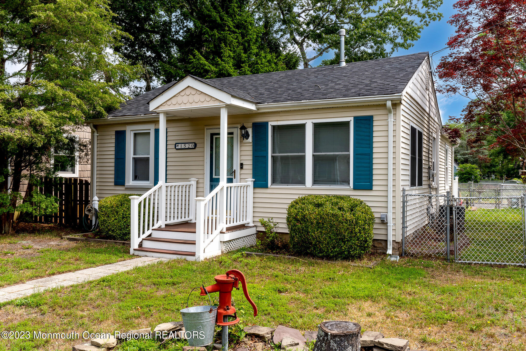 1520 Whitcomb Road Forked River, NJ 08731 - Photo 4 of 31 a front view of a house with garden