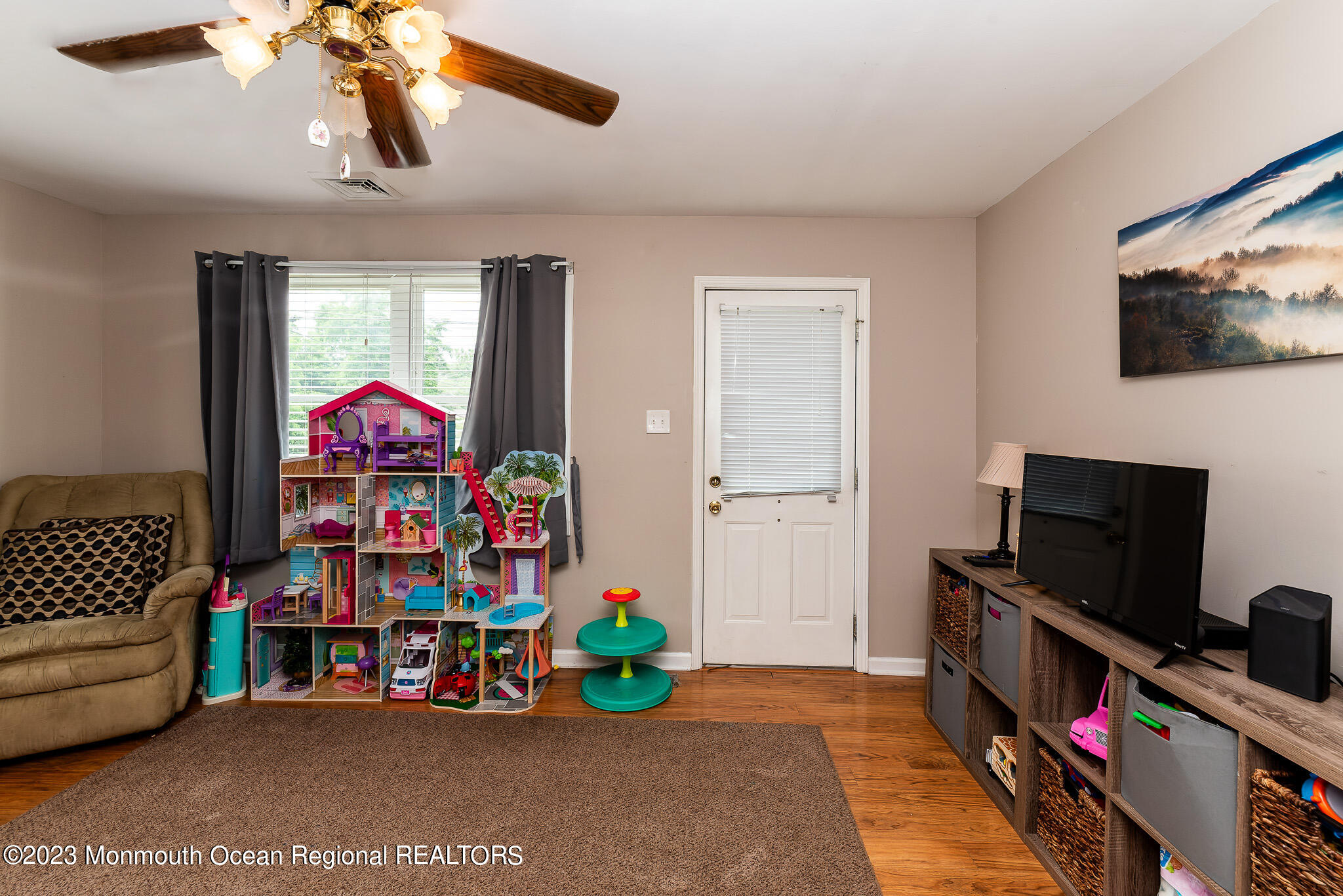 1520 Whitcomb Road Forked River, NJ 08731 - Photo 7 of 31 a children room with toys and a flat screen tv