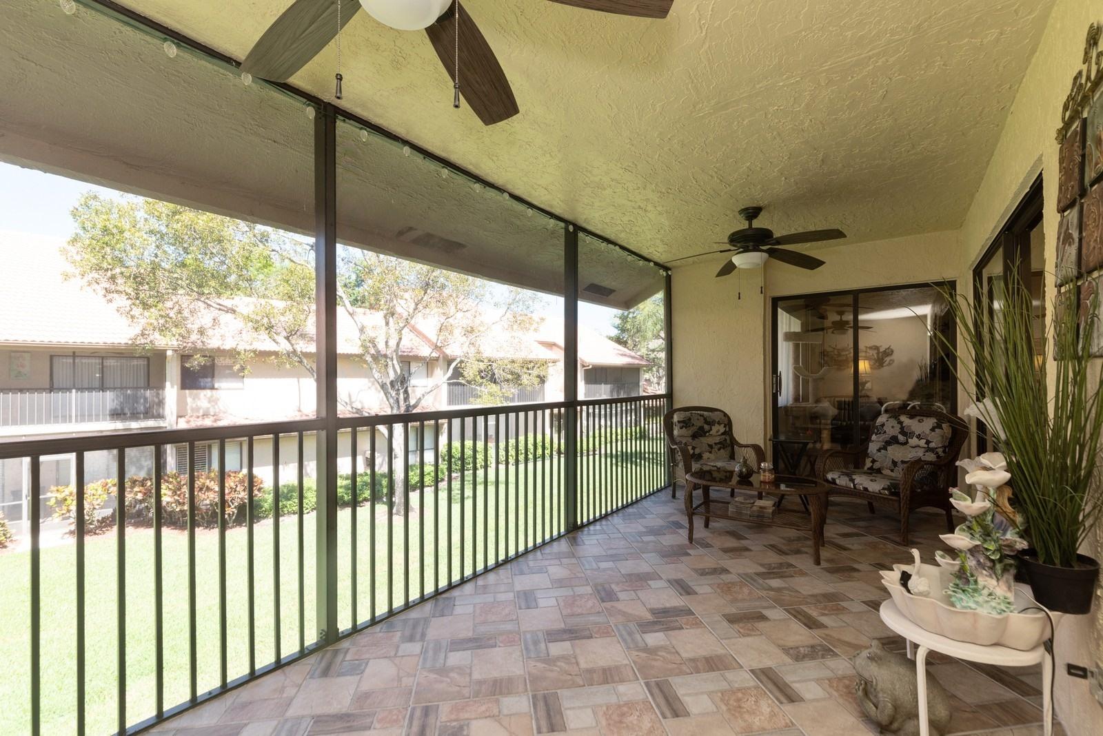 5710 Coach House Circle, Unit F Boca Raton, FL 33486 - Photo 14 of 18 14_5710CoachHouseCircleF_85_Patio_Custom