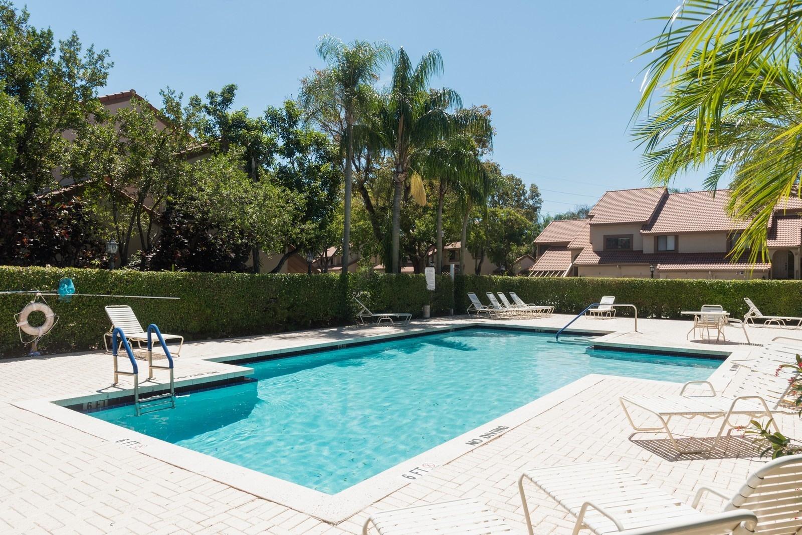 5710 Coach House Circle, Unit F Boca Raton, FL 33486 - Photo 15 of 18 15_5710CoachHouseCircleF_29_Pool_Custom_