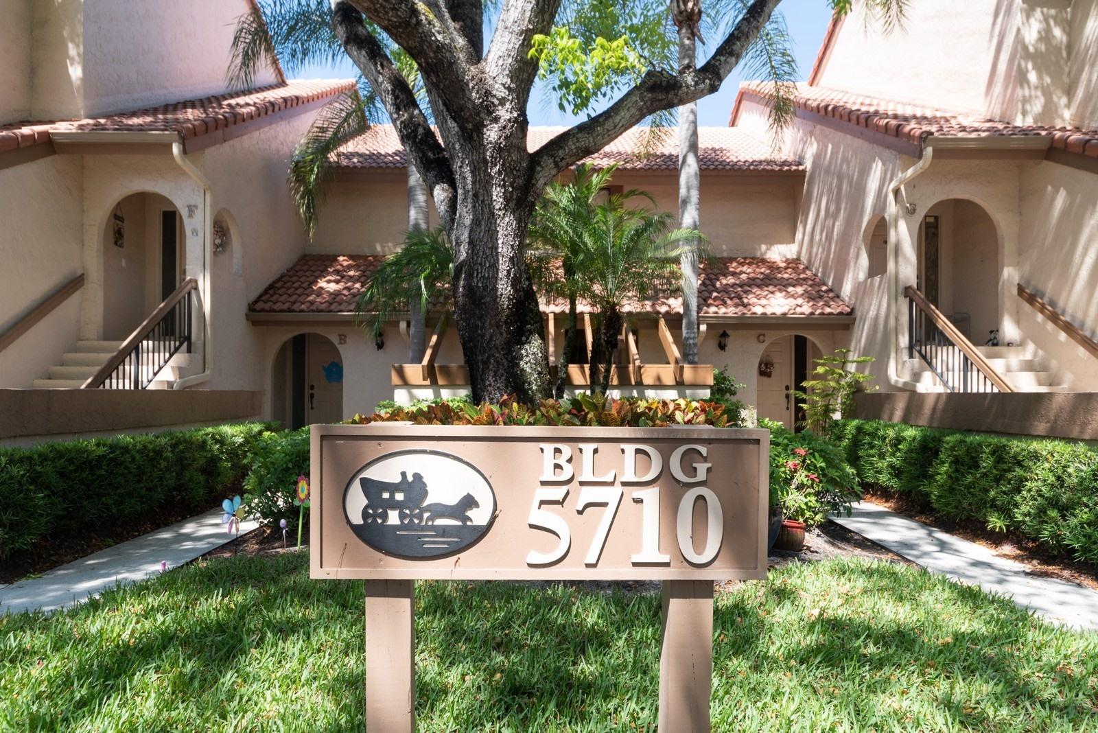 5710 Coach House Circle, Unit F Boca Raton, FL 33486 - Photo 4 of 18 02_5710CoachHouseCircleF_57_FrontView_Cu
