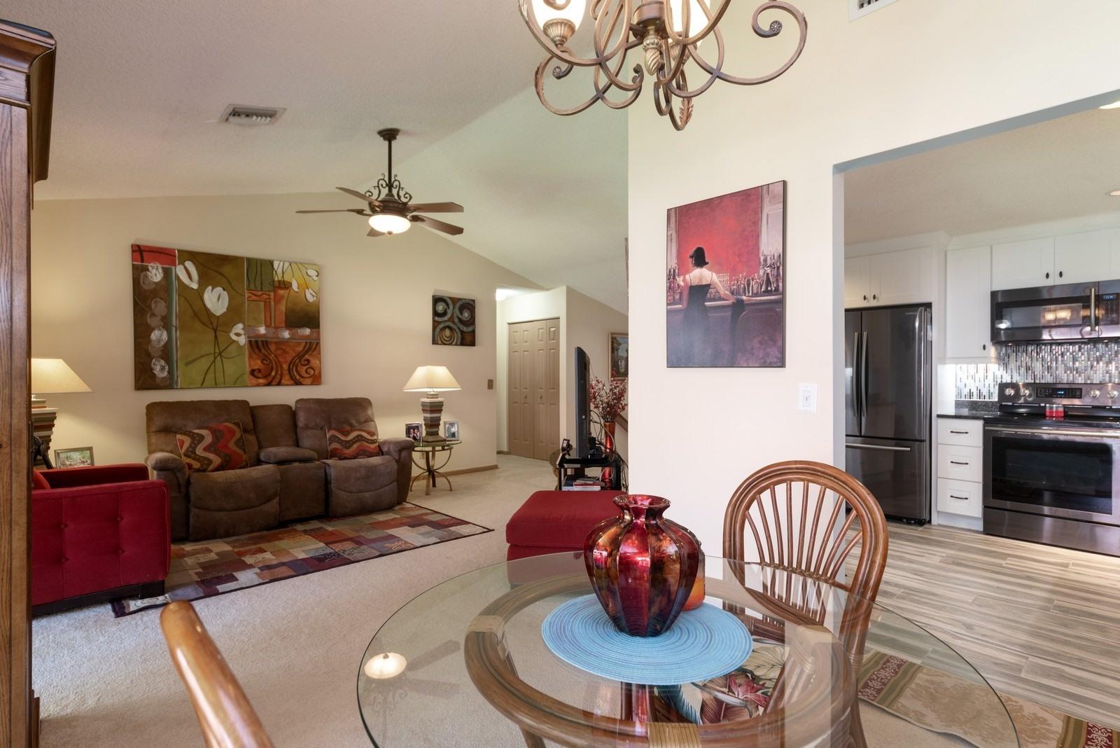 5710 Coach House Circle, Unit F Boca Raton, FL 33486 - Photo 6 of 18 04_5710CoachHouseCircleF_93_LivingRoomDi