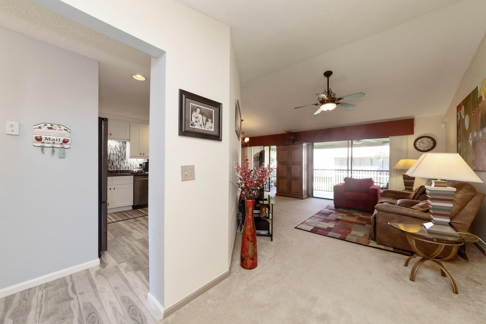 5710 Coach House Circle, Unit F Boca Raton, FL 33486 - Photo 7 of 18 07_5710CoachHouseCircleF_91_KitchenLivin