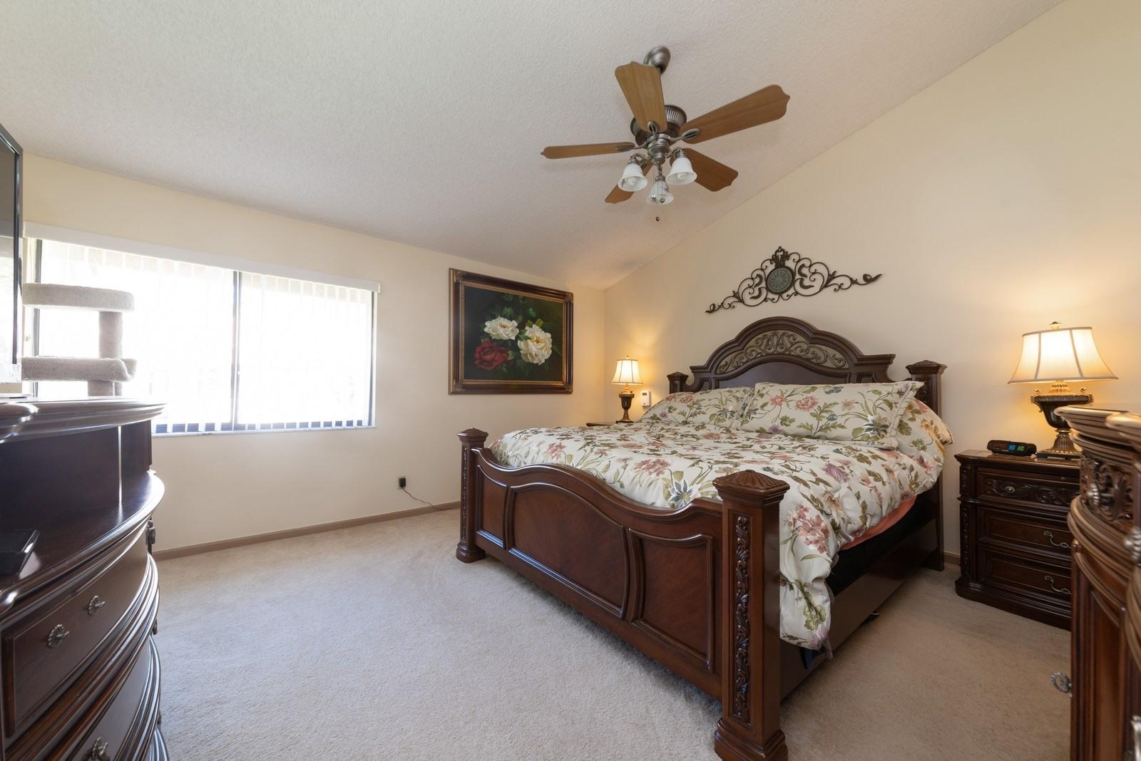 5710 Coach House Circle, Unit F Boca Raton, FL 33486 - Photo 9 of 18 09_5710CoachHouseCircleF_14_MasterBedroo
