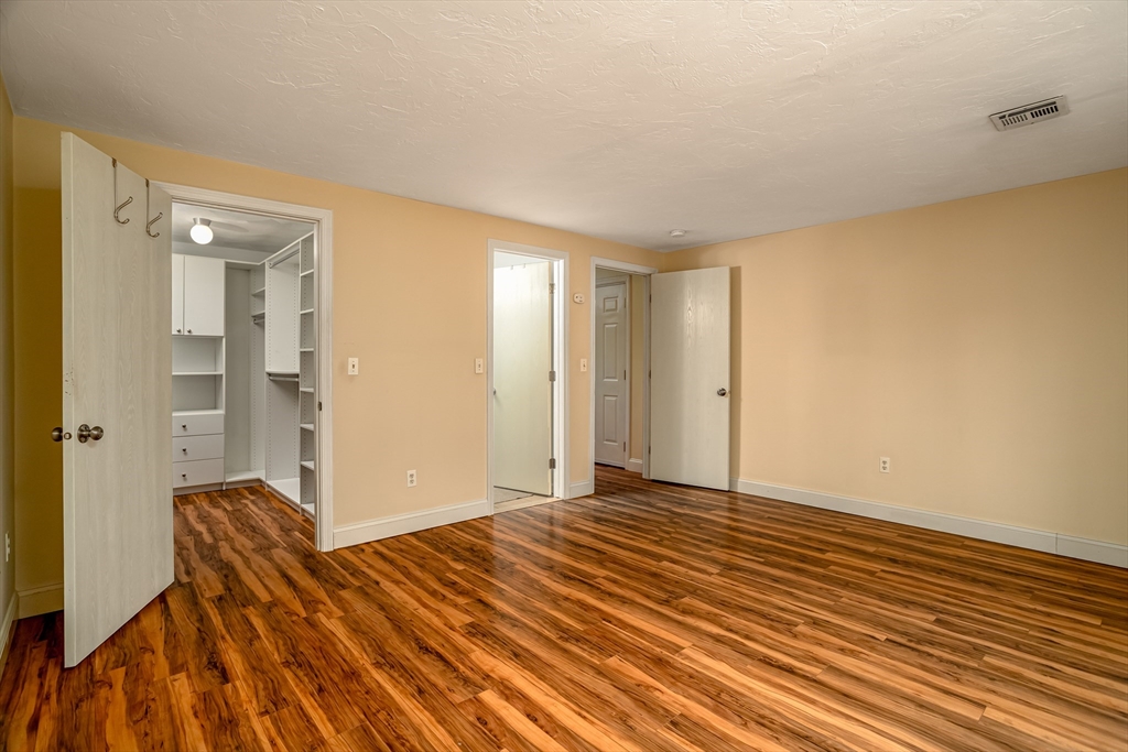 115 Ridgefield Circle, Unit D Clinton, MA 01510 - Photo 15 of 29 a view of room with wooden floor