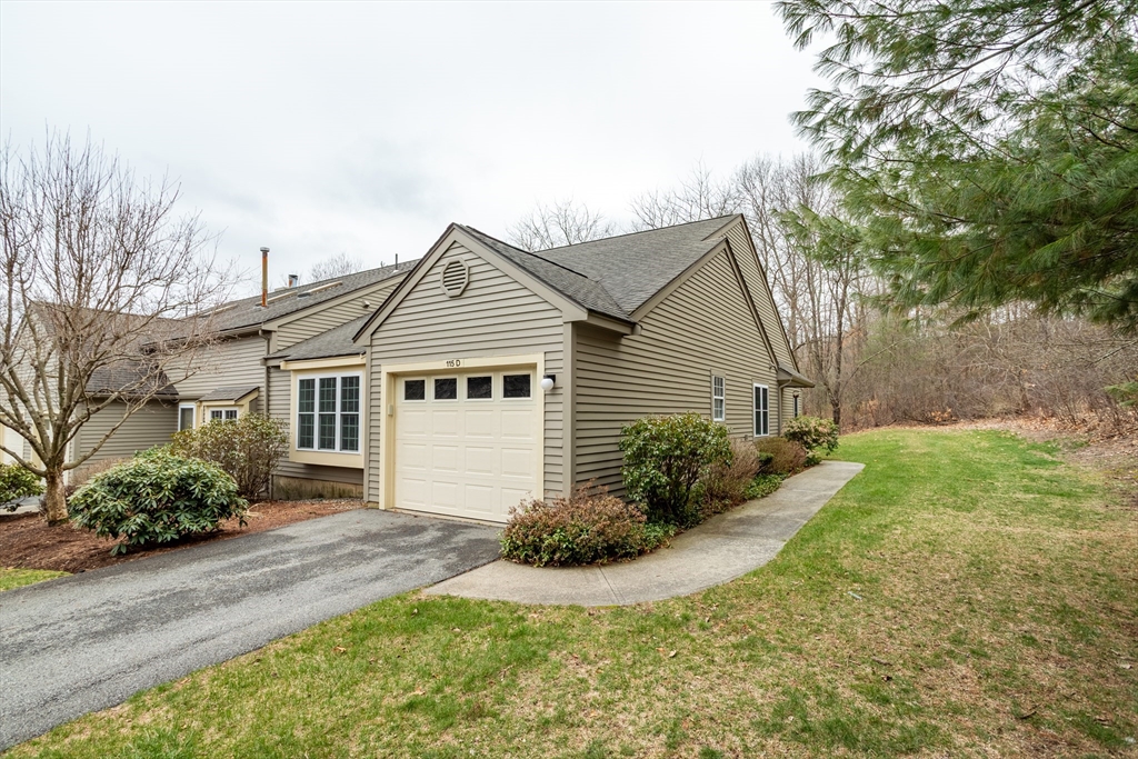115 Ridgefield Circle, Unit D Clinton, MA 01510 - Photo 2 of 29 a view of a house with yard and plants
