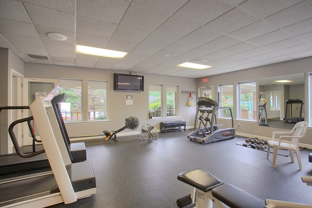 115 Ridgefield Circle, Unit D Clinton, MA 01510 - Photo 29 of 29 a view of a room with gym equipment