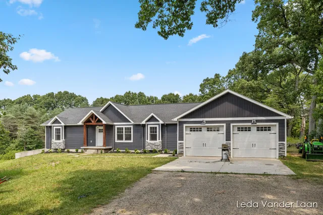 $565,000 | 7385 14 Mile Road Northeast, Cedar Springs, MI 49319