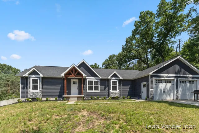 $565,000 | 7385 14 Mile Road Northeast, Cedar Springs, MI 49319