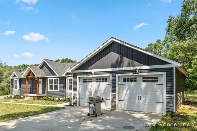 $565,000 | 7385 14 Mile Road Northeast, Cedar Springs, MI 49319