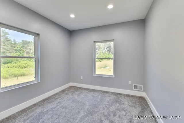 $565,000 | 7385 14 Mile Road Northeast, Cedar Springs, MI 49319