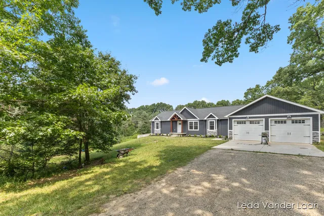 $565,000 | 7385 14 Mile Road Northeast, Cedar Springs, MI 49319